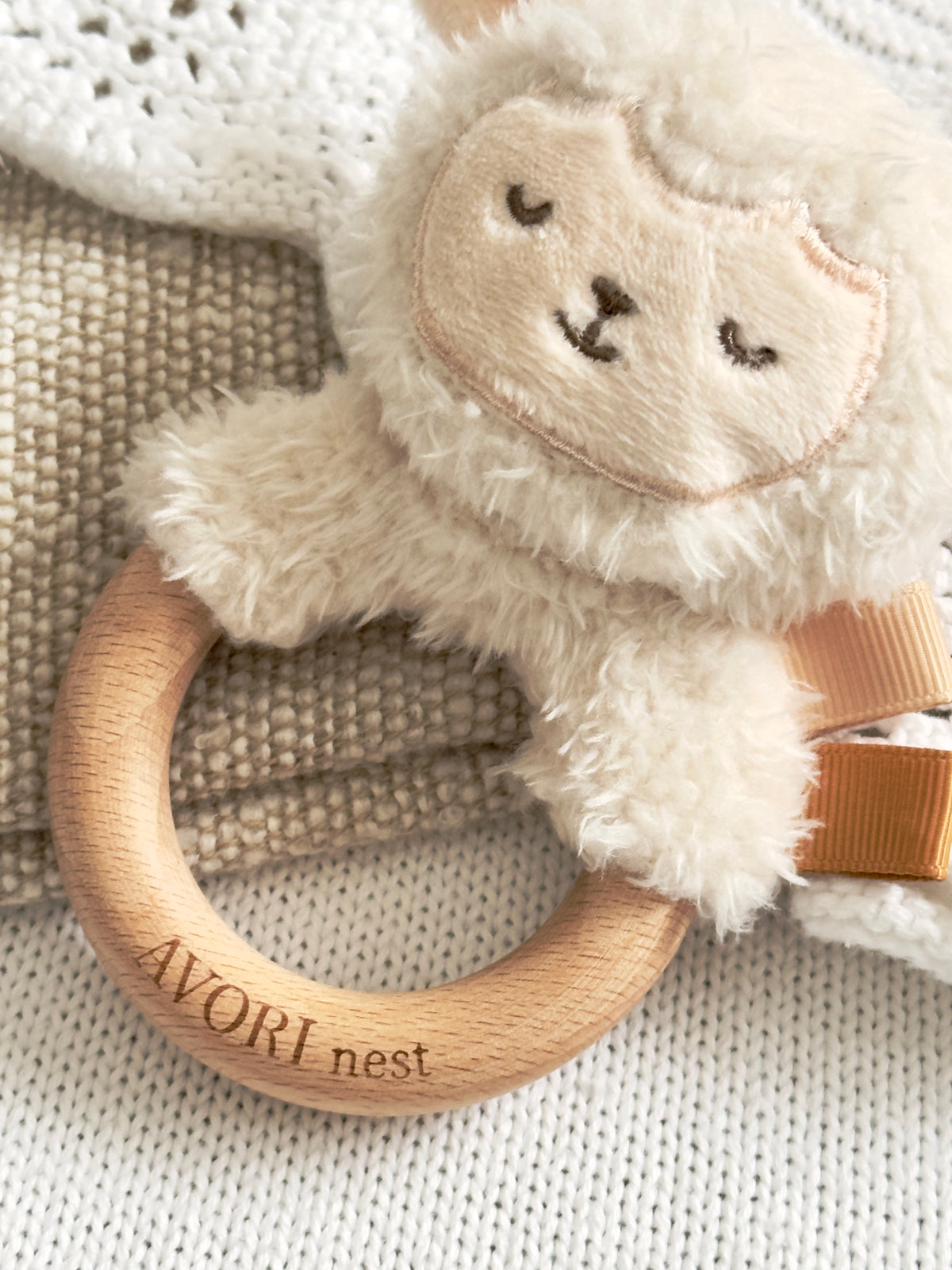Close up of Sleepy Lamb Baby Rattle